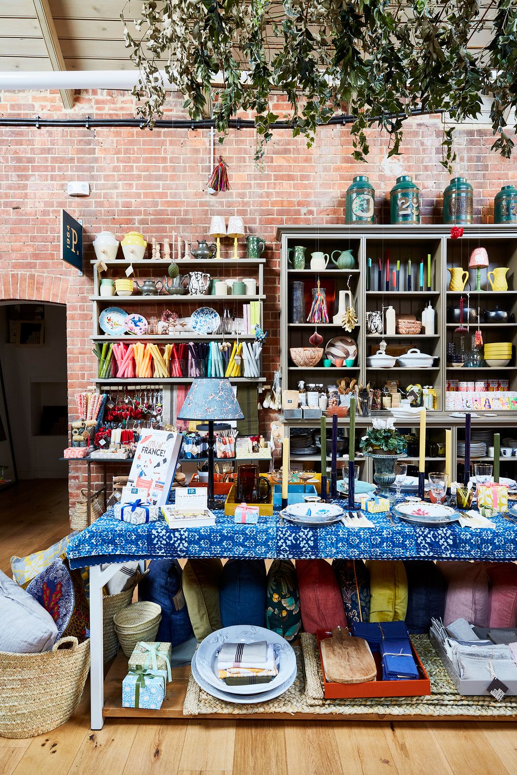 Image may contain Shelf Furniture and Shop