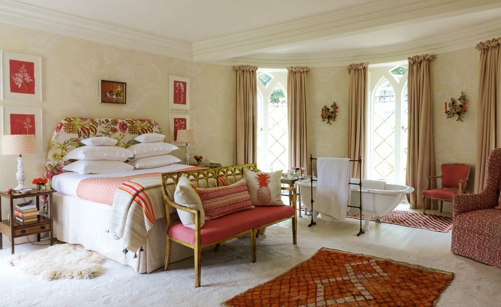 Image may contain Living Room Room Indoors Furniture Couch Chair Rug and Interior Design