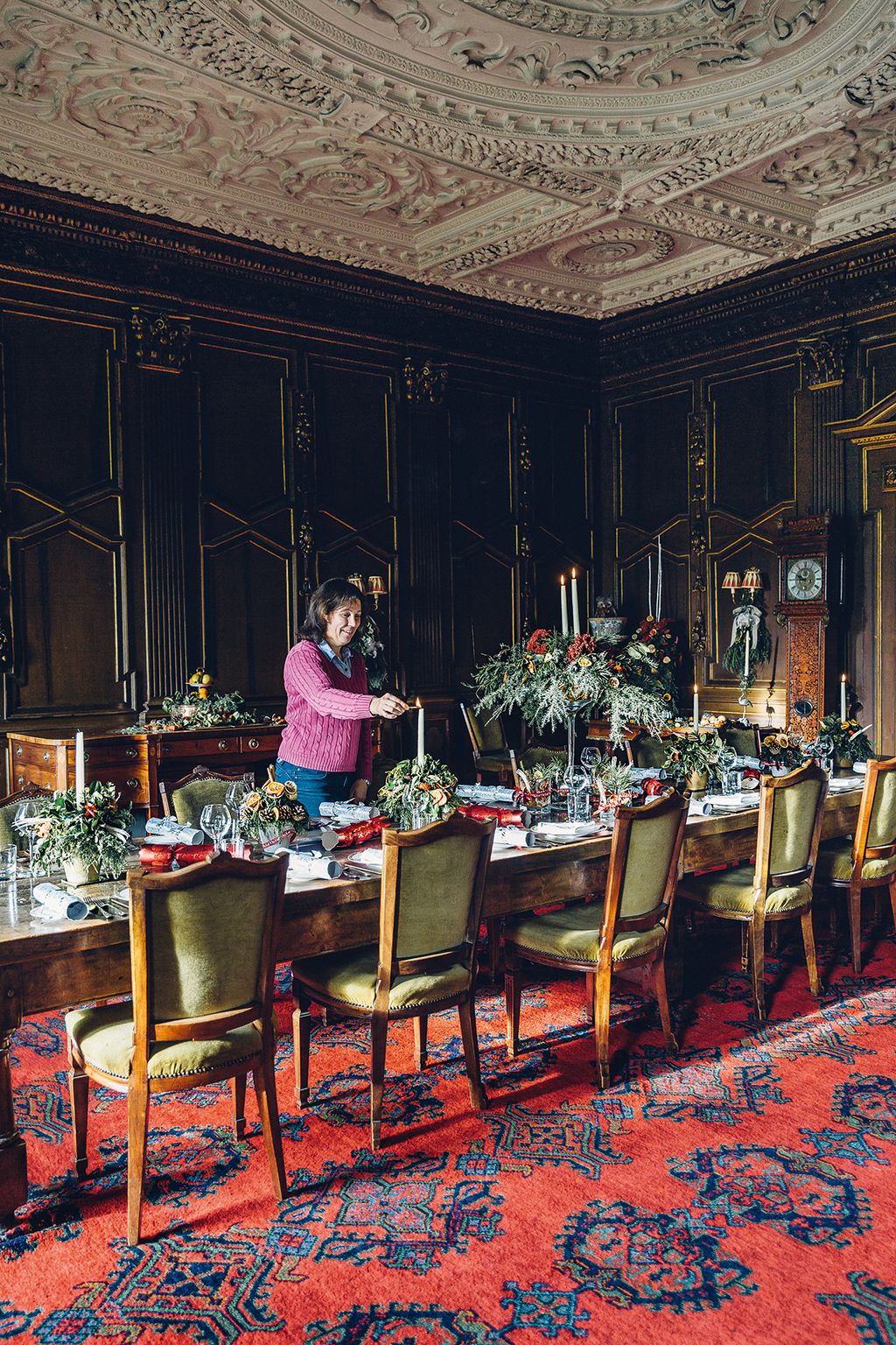 Image may contain Human Person Furniture Chair Indoors Rug Plant Room Pub Restaurant Dining Room and Bar Counter