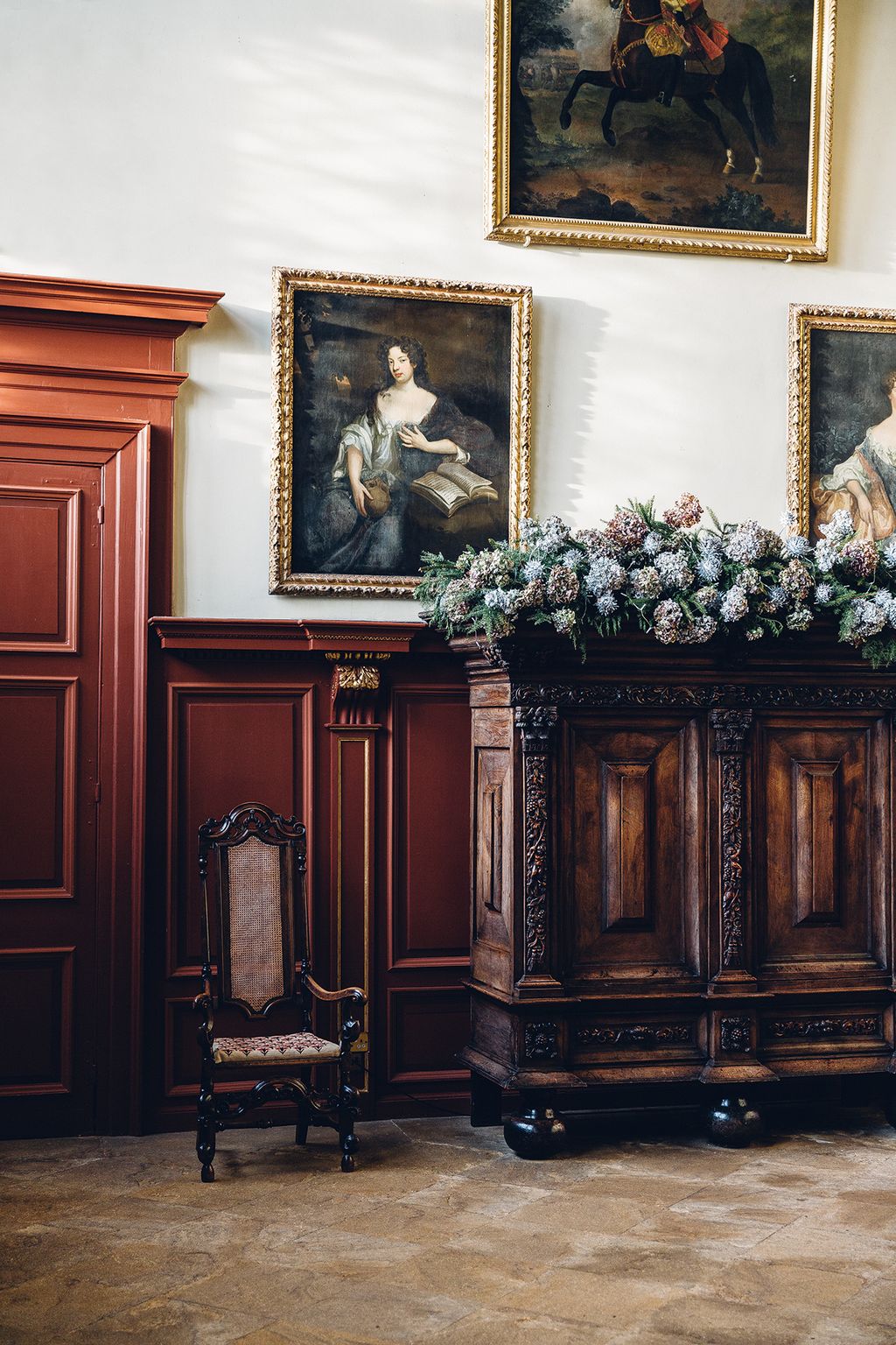 Displays of seasonal foliage and flowers in the great hall.