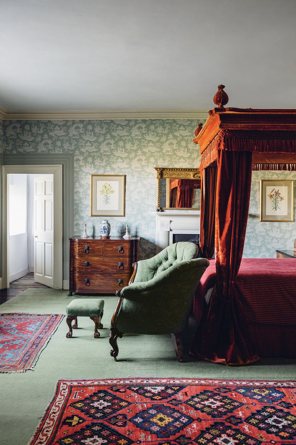 A Queen Anne fourposter creates a striking focal point.