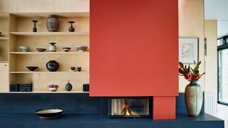 Image may contain Indoors Fireplace Interior Design and Hearth