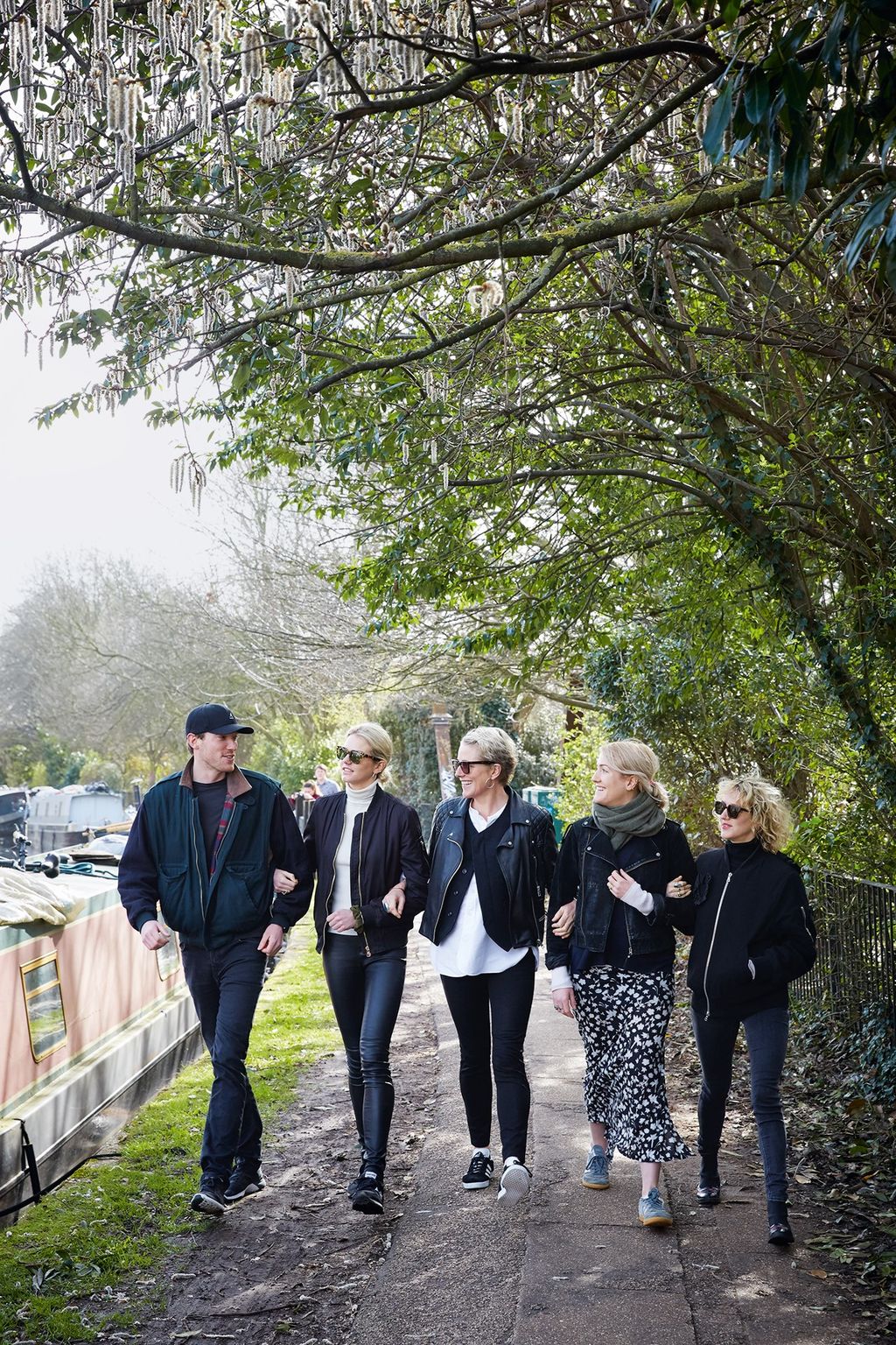 Bella with four of her children from left Joe Georgie Gussie and Flora walking along the canal near Trellick Tower.