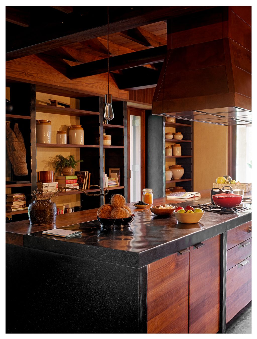 Image may contain Shelf Furniture Room Indoors Kitchen Island Food Meal Kitchen and Wood