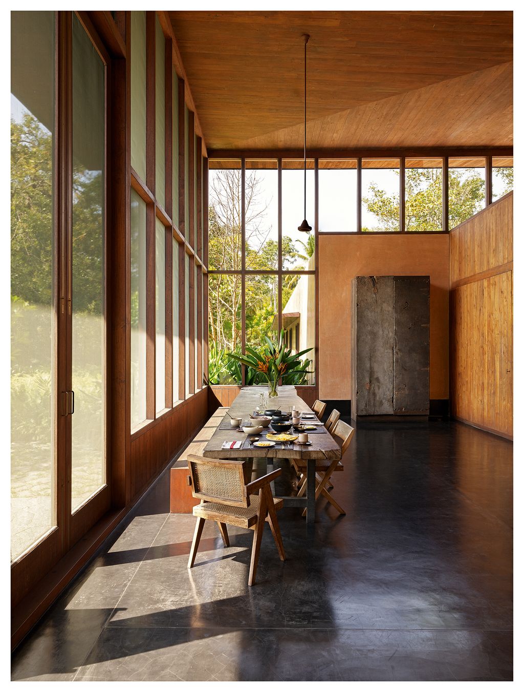 Image may contain Flooring Floor Wood Hardwood Furniture Chair Interior Design Indoors Living Room and Room