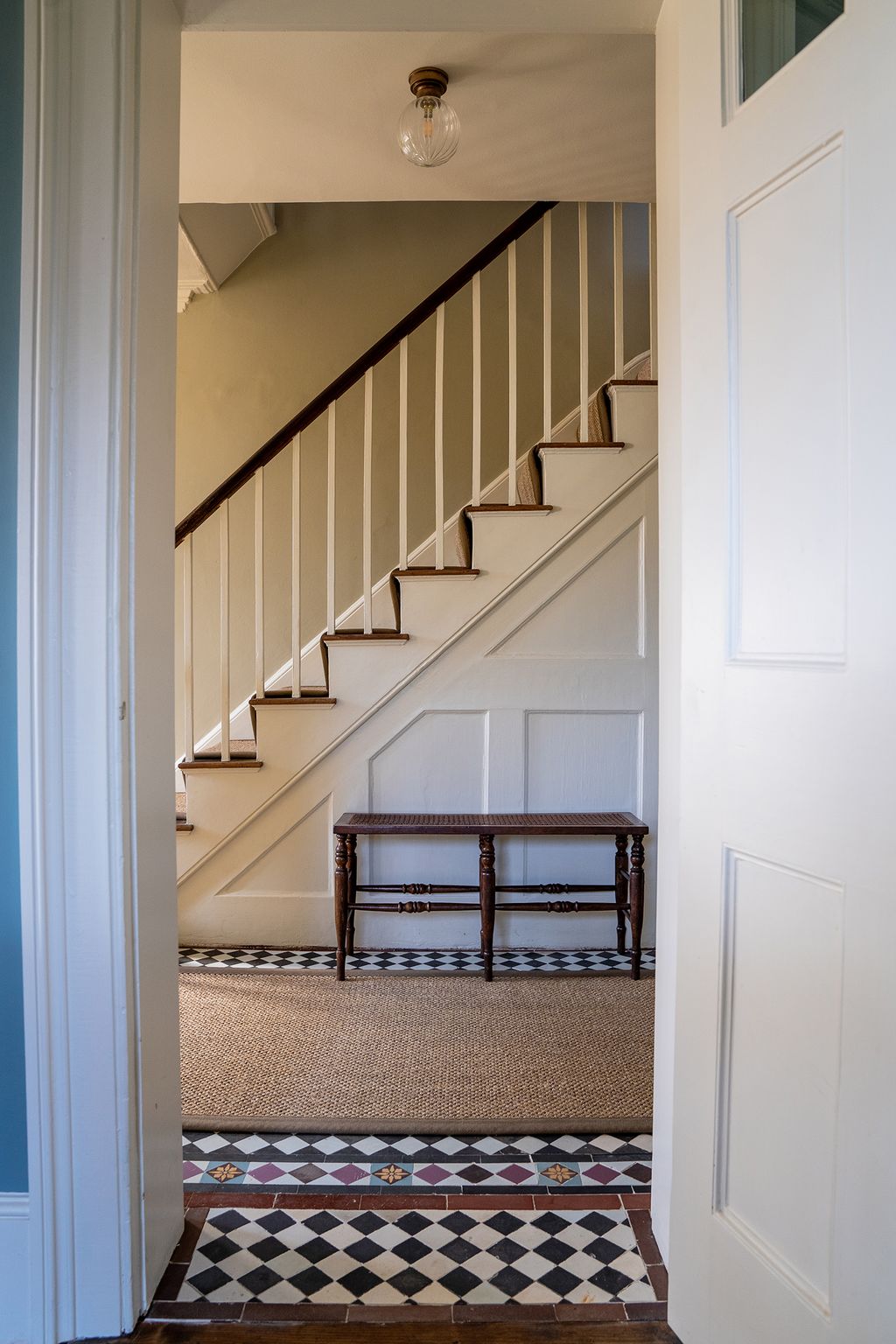 Image may contain Staircase Wood Banister Handrail Hardwood Flooring Interior Design Indoors and Floor