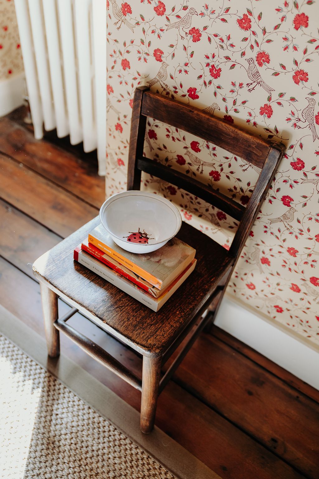 Image may contain Furniture Wood Table Coffee Table Saucer Pottery Hardwood and Sideboard