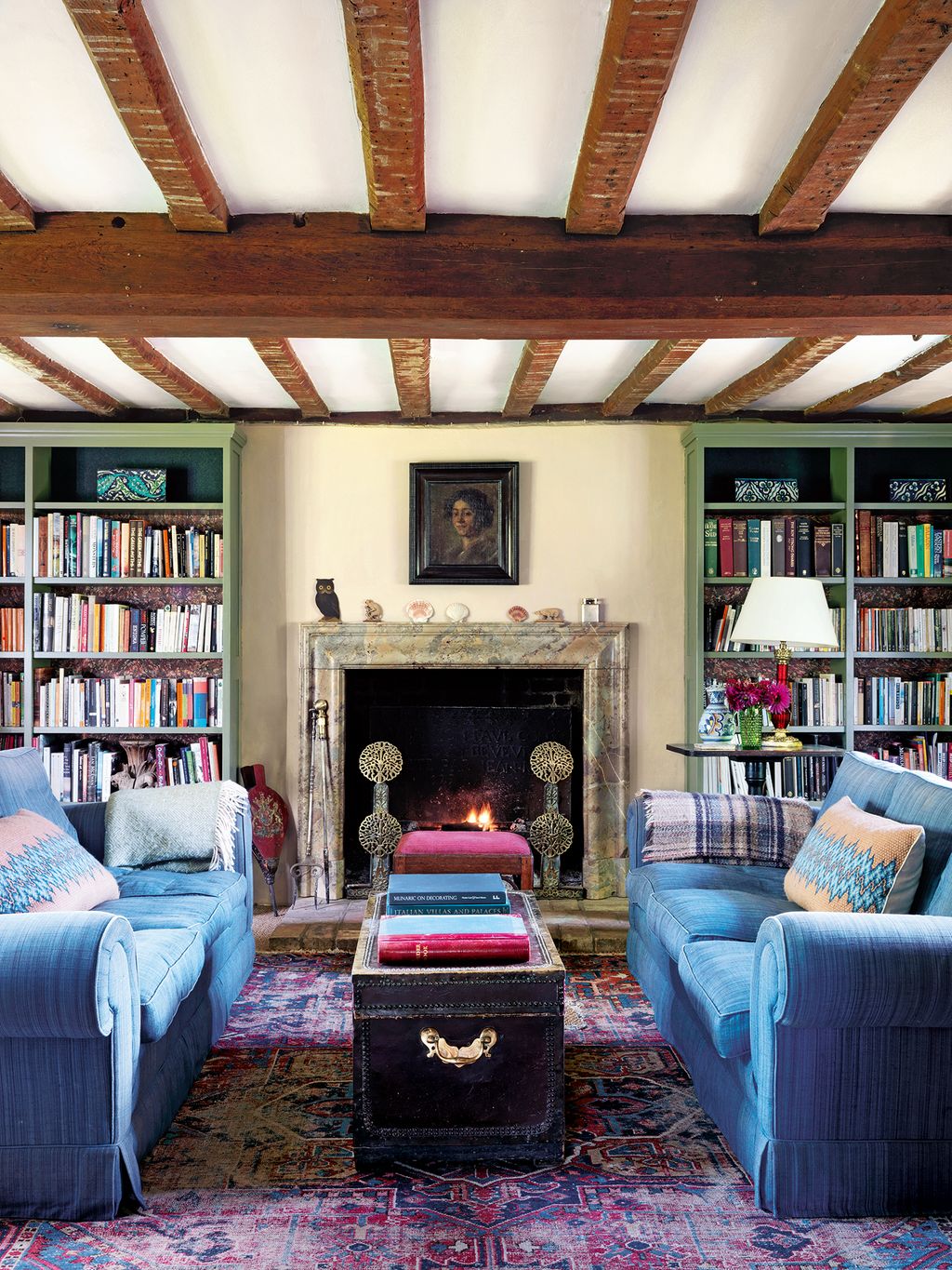 Image may contain Furniture Couch Living Room Room Indoors Interior Design Cushion and Rug