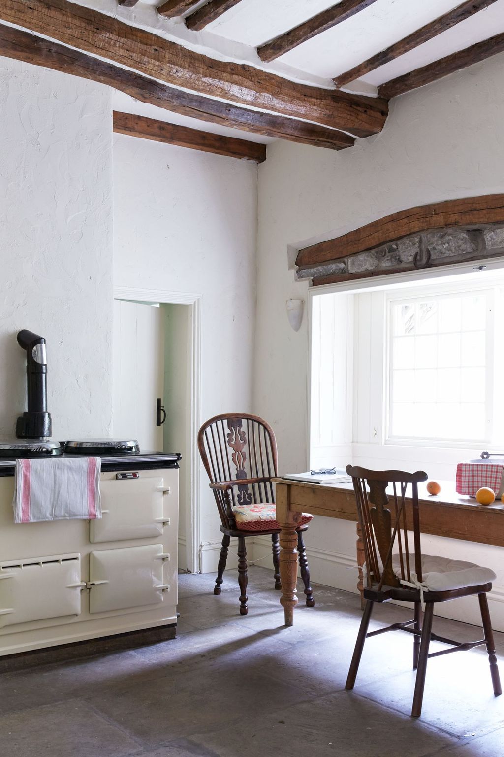 Image may contain Furniture Chair Wood Indoors Room and Table