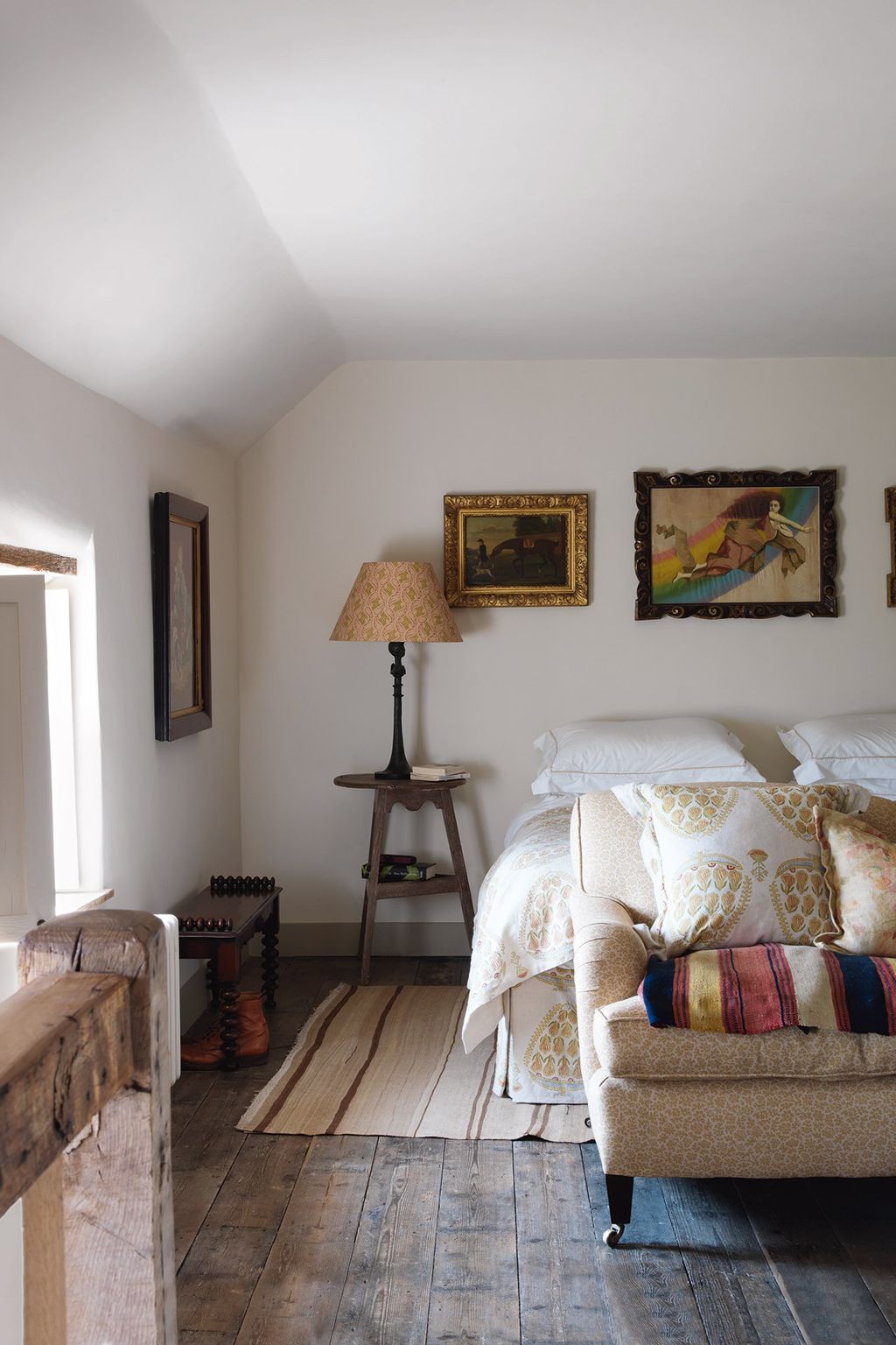 Image may contain Living Room Room Indoors Bedroom Furniture Interior Design Flooring Couch Wood and Floor