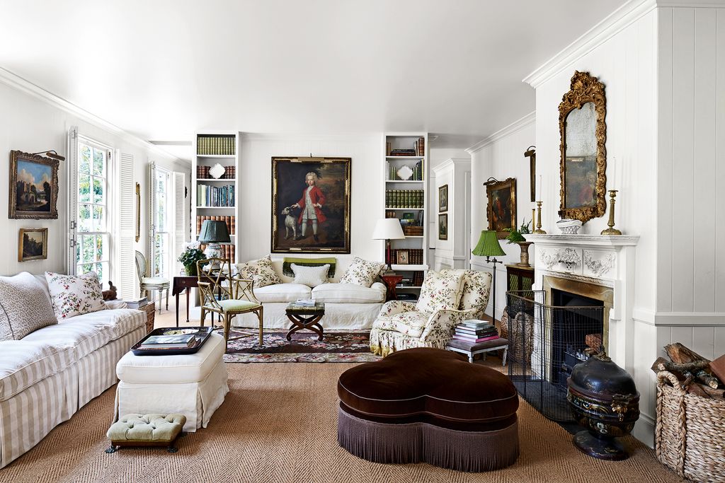 Image may contain Furniture Living Room Indoors Room Couch Interior Design Human Person and Rug