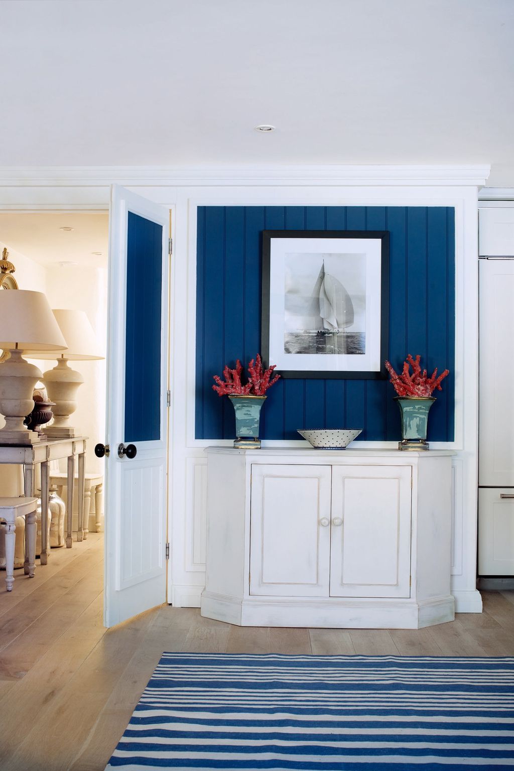 Image may contain Furniture Sideboard Rug Cupboard Closet Cabinet and Indoors