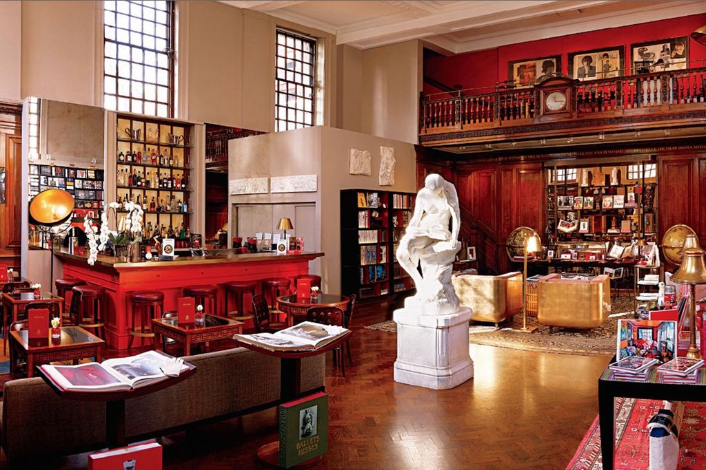 Image may contain Flooring Furniture Floor Shelf Wood Bookcase and Indoors