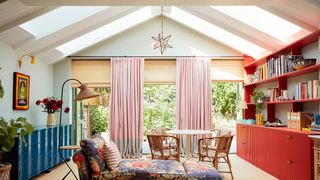 Image may contain Interior Design Indoors Living Room Room Flooring Furniture Floor Cushion Wood and Chair