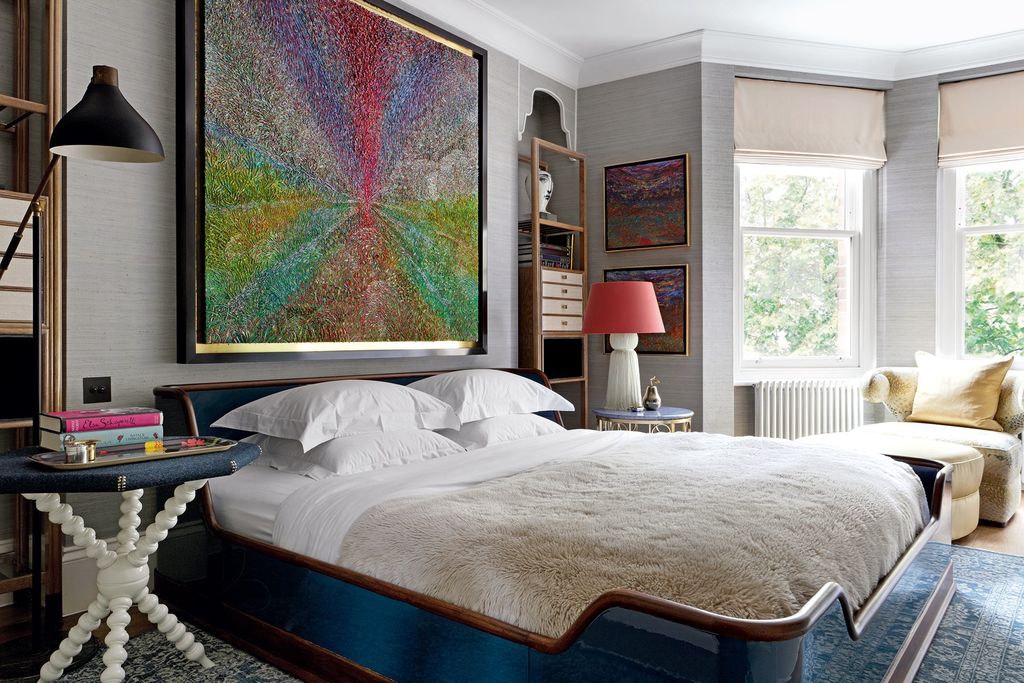 For the bedroom a Victorian bobbin table has been repurposed and sits next to a bed by And Objects Martin created...