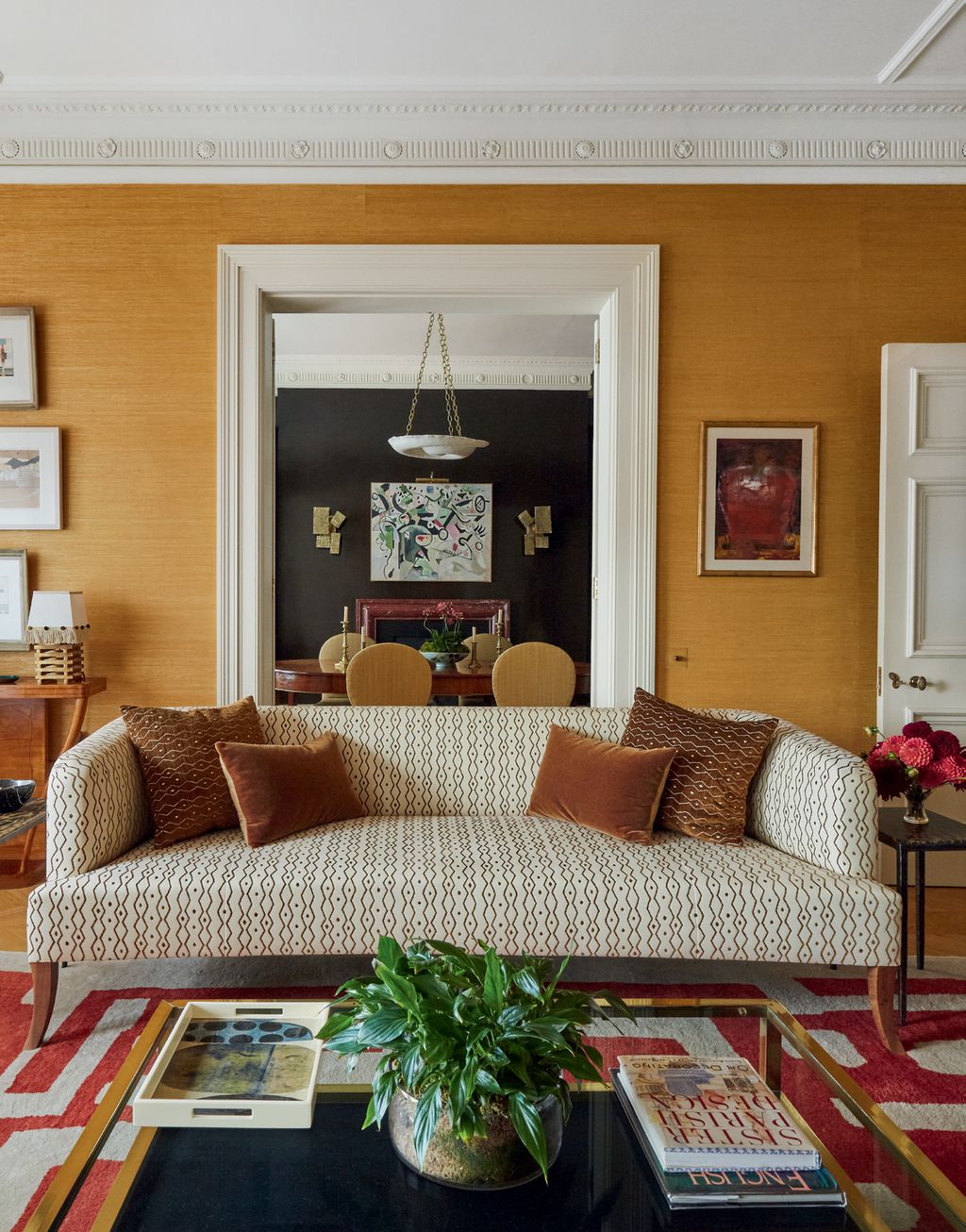 Image may contain Living Room Room Indoors Furniture Couch Table and Rug