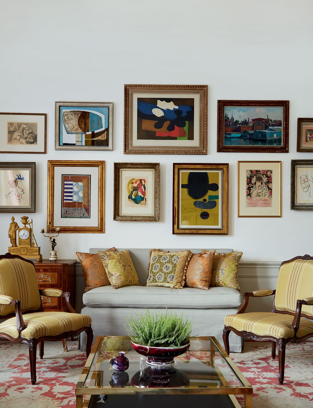 Image may contain Furniture Couch Living Room Indoors Room Table and Rug