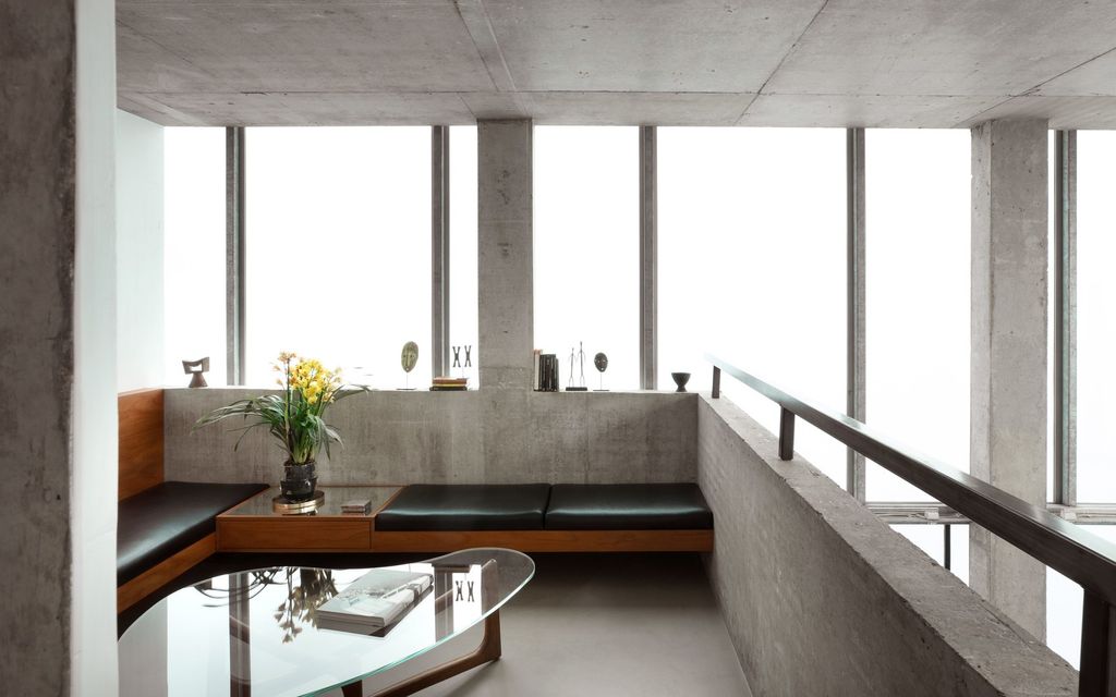 Image may contain Interior Design Indoors Furniture Housing Building Table Room and Lobby