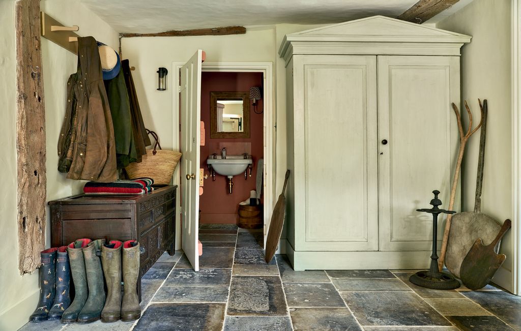 Image may contain Flooring Floor Clothing Apparel Furniture Flagstone Footwear and Boot