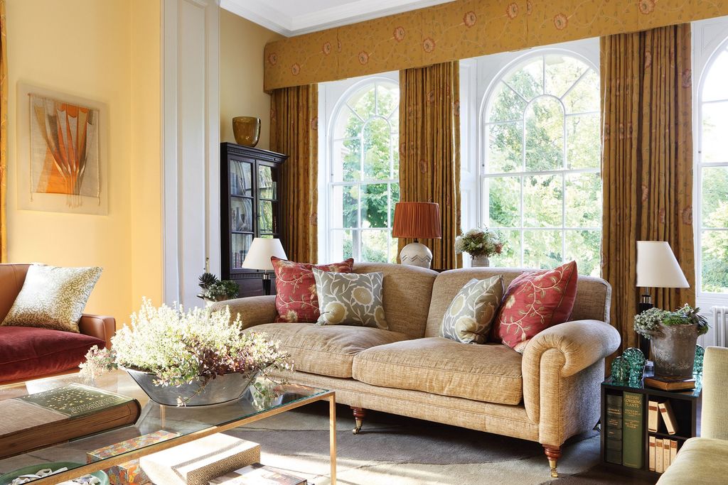 Image may contain Furniture Couch Table Living Room Room Indoors Coffee Table Cushion and Rug