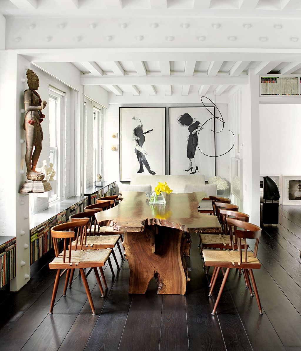 Image may contain Wood Flooring Human Person Hardwood Floor Plywood Interior Design Indoors Furniture and Chair