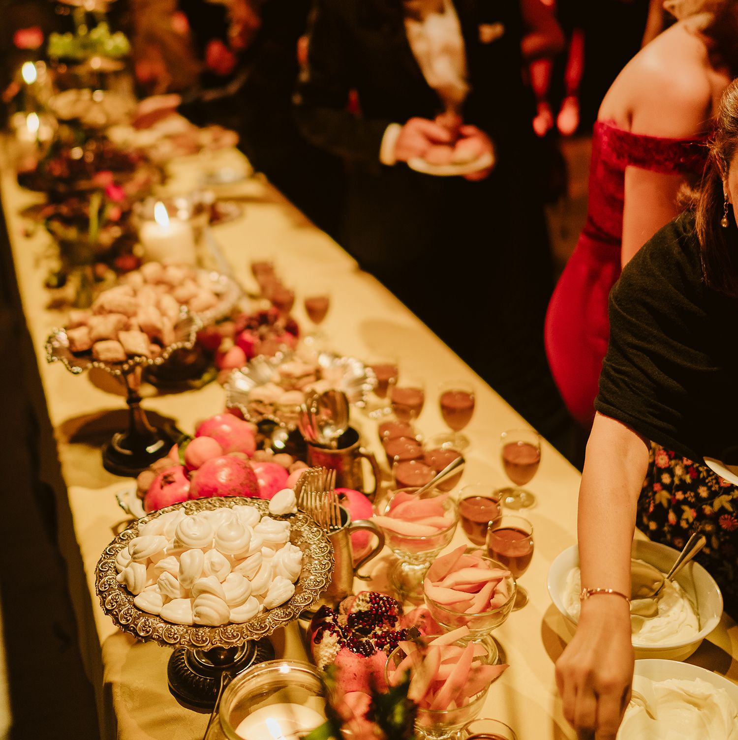 Image may contain Food Confectionery Sweets Human Person Meal Restaurant Cafeteria Buffet Icing Dessert and Cake