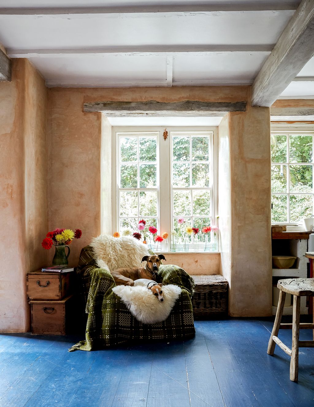 Image may contain Furniture Living Room Indoors Room Couch Wood and Rug