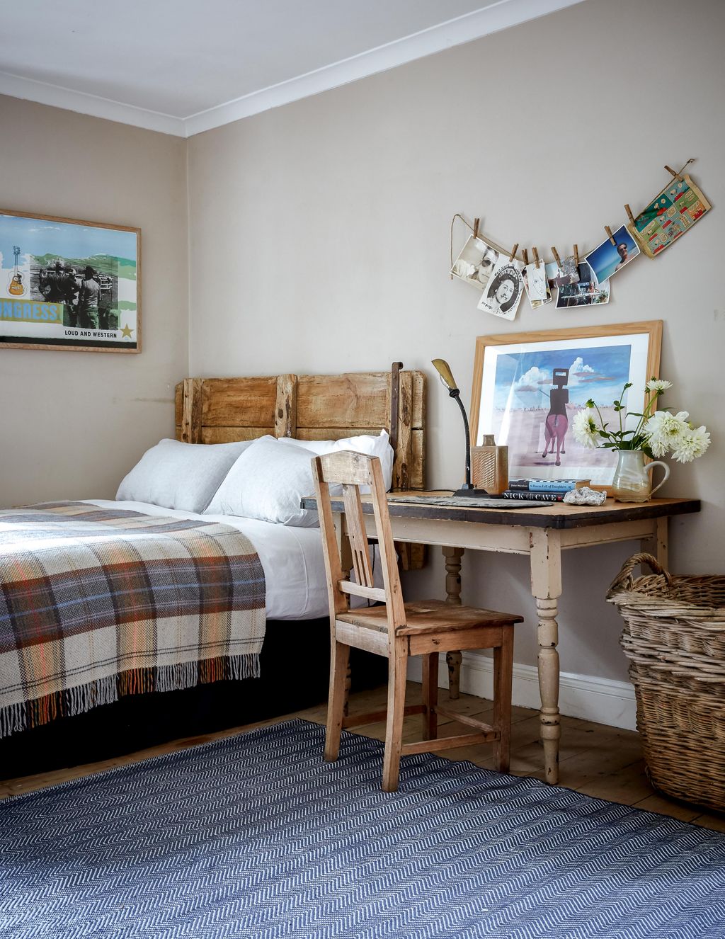 Image may contain Room Bedroom Indoors Furniture Interior Design Wood Rug Hardwood Flooring Corner Bed and Chair