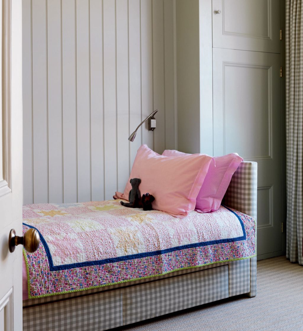 Image may contain Furniture Bed Room Bedroom Indoors Cushion and Pillow