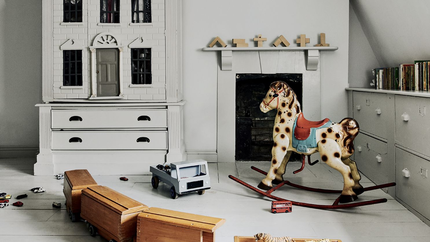 Image may contain Living Room Room Indoors Wood Toy Interior Design Furniture Animal Dog Mammal Pet and Canine