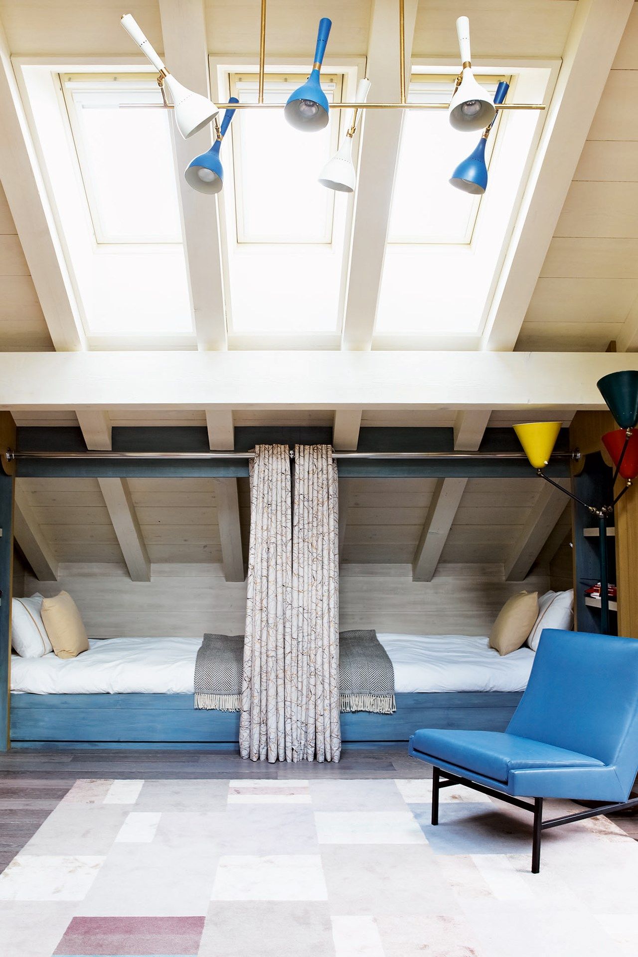 Image may contain Housing Building Room Bedroom Indoors Furniture Chair Dorm Room Cushion Pillow and Bed