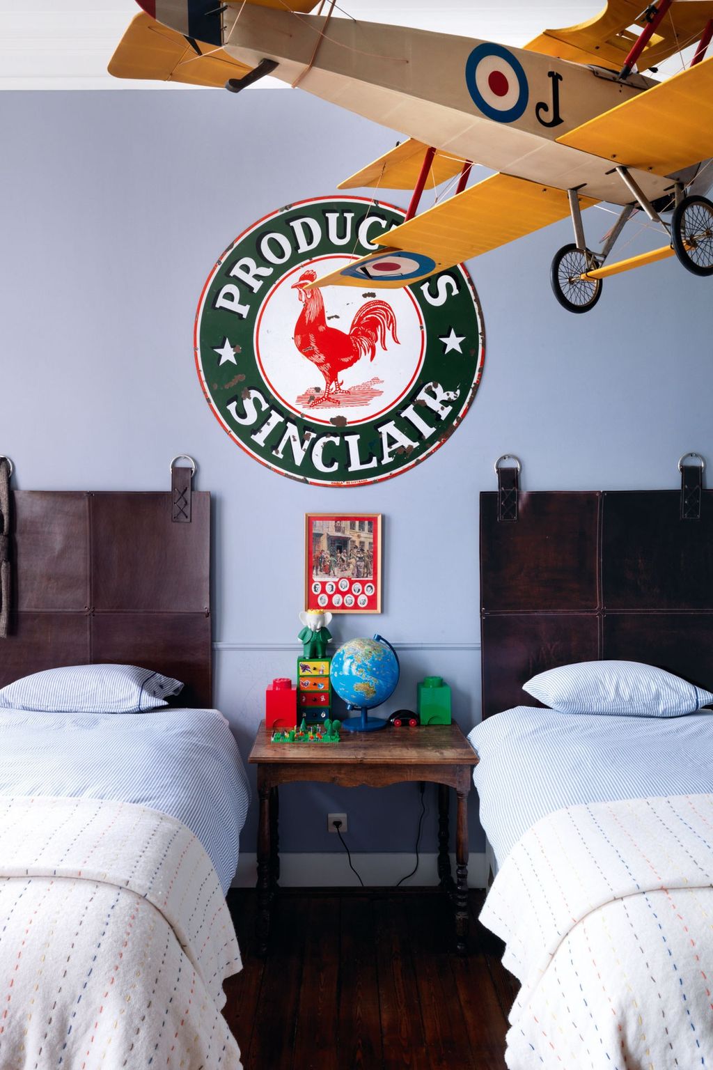 Image may contain Room Bedroom Indoors Furniture Bed Vehicle Transportation Aircraft Airplane and Dorm Room