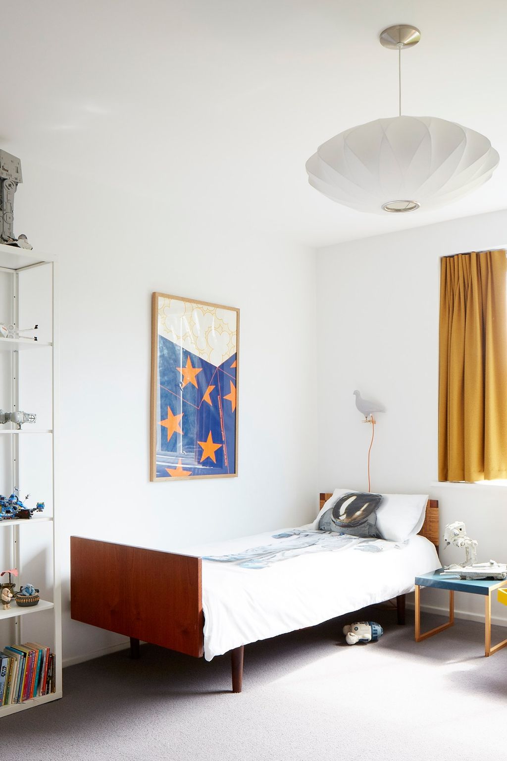 Image may contain Indoors Room Bedroom Furniture Bed and Dorm Room