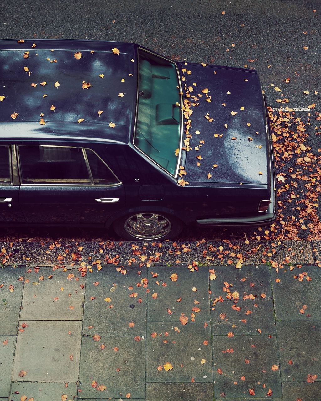 Johns 1981 Bentley parked in the London square where he lives.