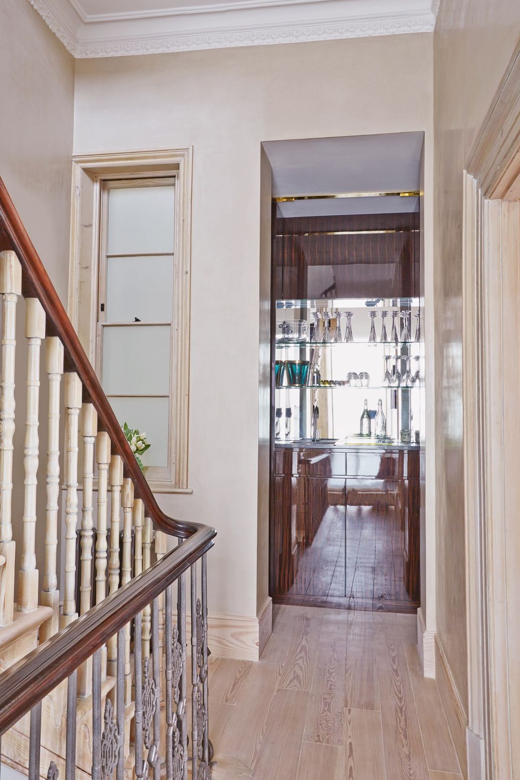 Image may contain Banister Handrail Railing and Staircase