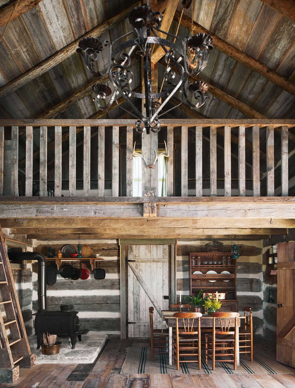 Image may contain Furniture Chair Wood Loft Housing Building Indoors Plywood Dining Table Table Attic and Shelf