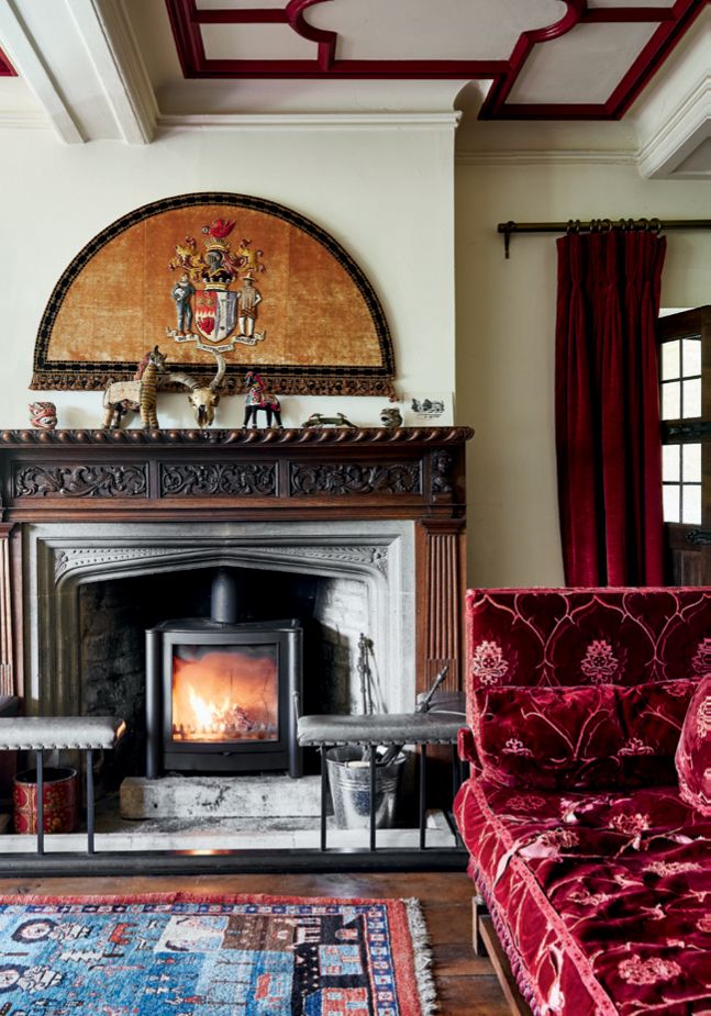 Image may contain Fireplace Indoors Hearth Furniture Home Decor Living Room and Room