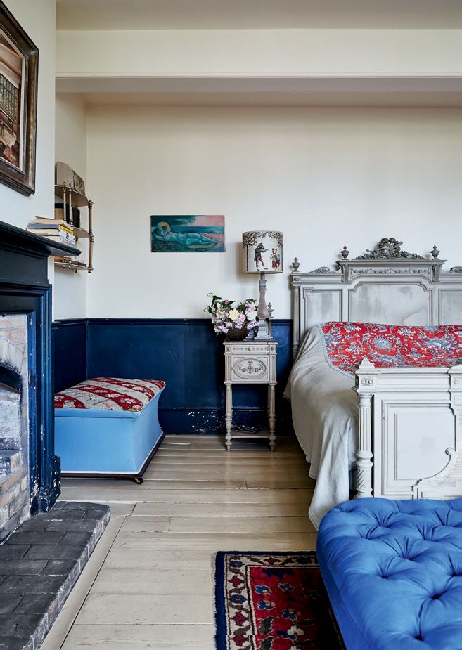 Image may contain Indoors Room Furniture Bedroom Interior Design Living Room Bed Couch and Flooring