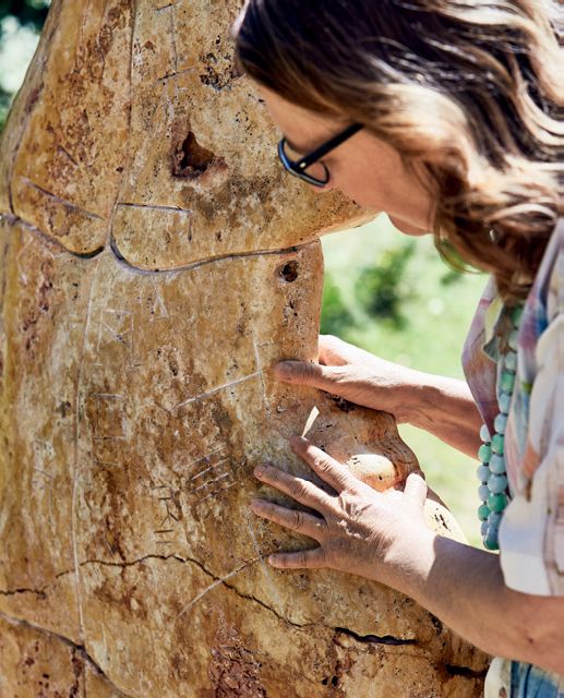 Image may contain Human Person Outdoors Plant and Tree
