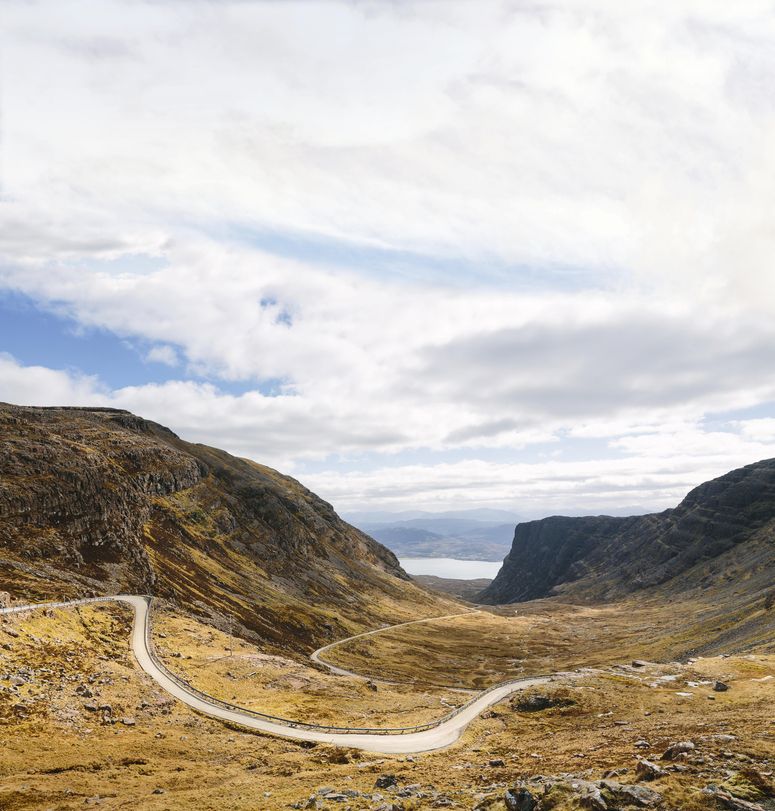 Image may contain: Nature, Outdoors, Plateau, Mountain, Countryside, Road, Dirt Road, Gravel, and Hill