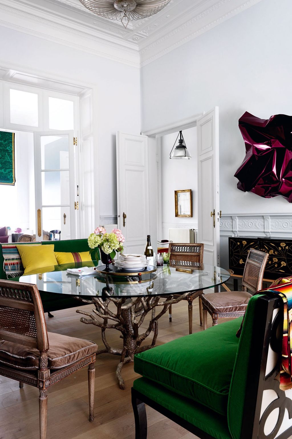 Image may contain Furniture Chair Table Living Room Room Indoors Interior Design and Coffee Table