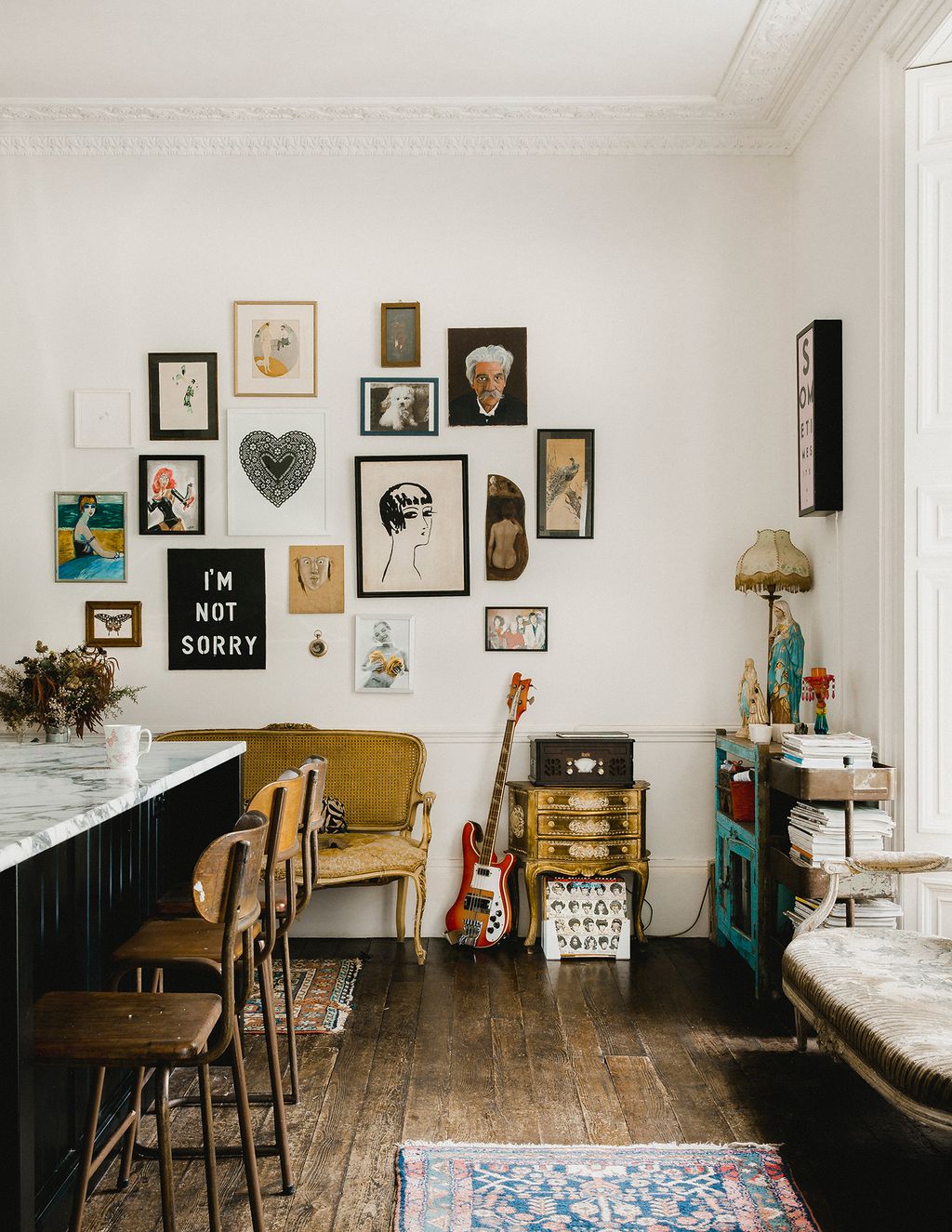 Image may contain Wood Flooring Human Person Indoors Room Plywood Furniture Albert Schweitzer and Living Room