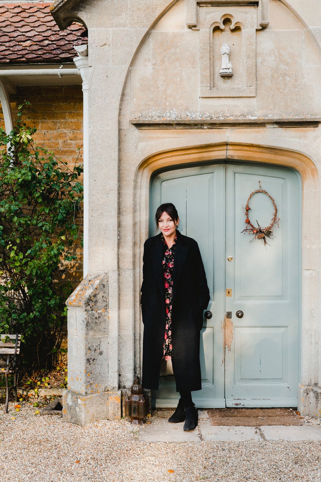 Image may contain Door Pearl Lowe Clothing Apparel Overcoat Coat Human and Person