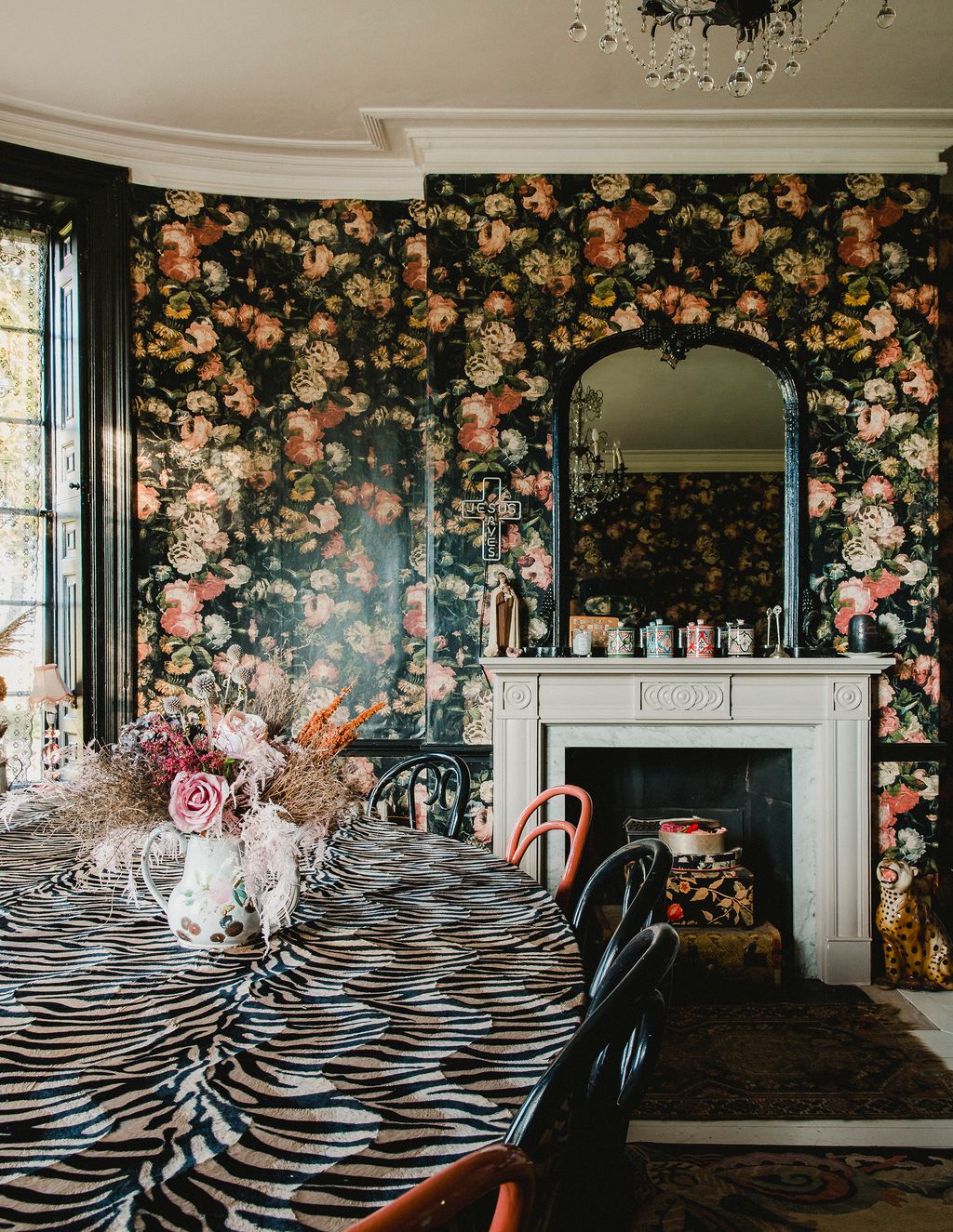 Image may contain Indoors Living Room Room Home Decor Fireplace Furniture Chair Hearth and Interior Design