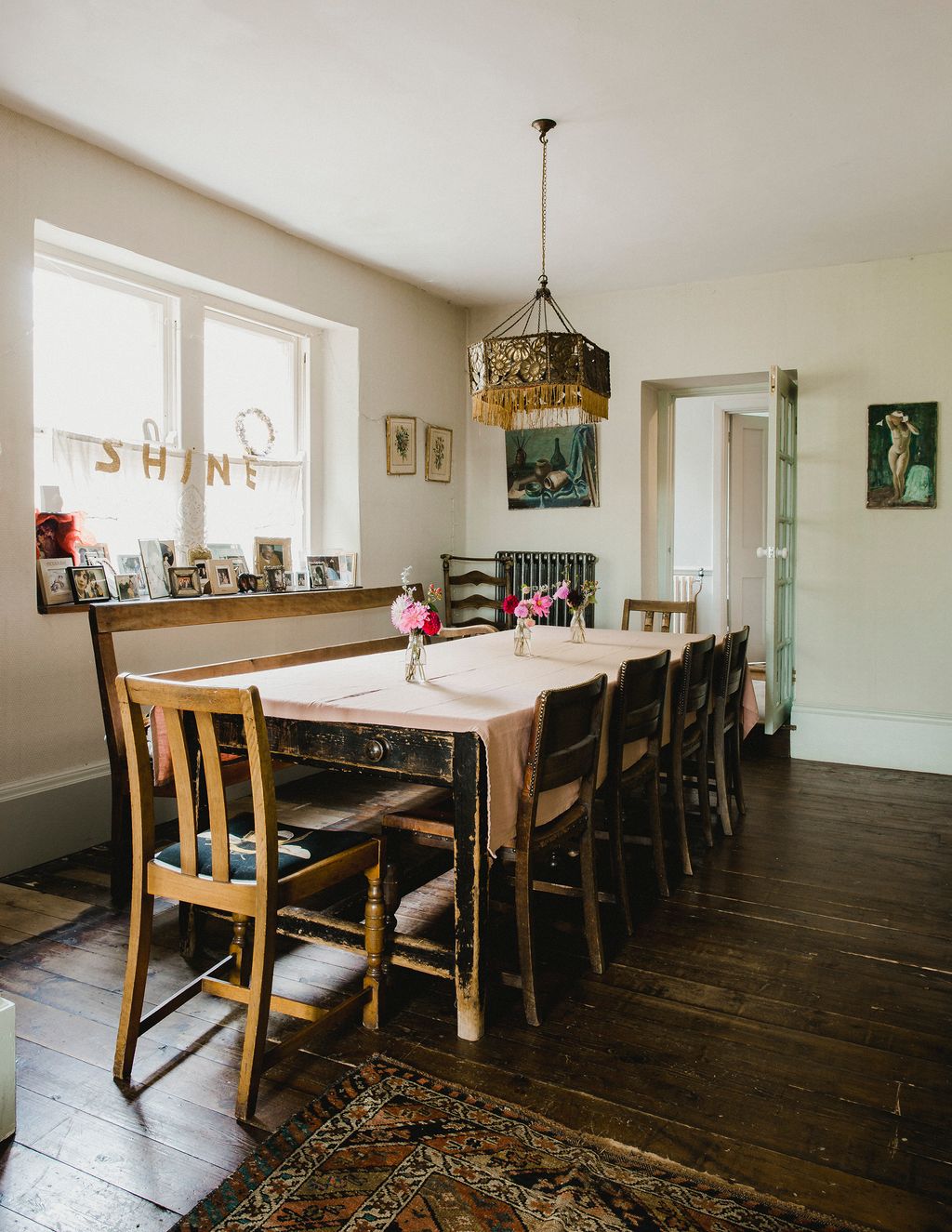 Image may contain Wood Hardwood Flooring Floor Room Indoors Furniture Chair Living Room and Interior Design