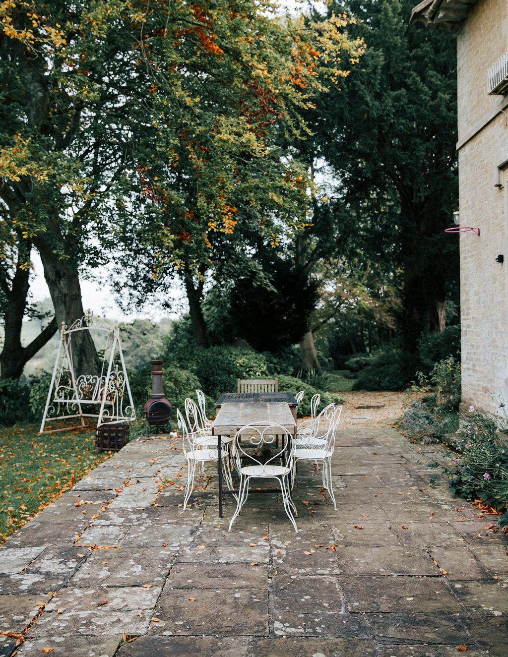 Image may contain Flagstone Furniture Chair Patio Dining Table Table Outdoors and Path