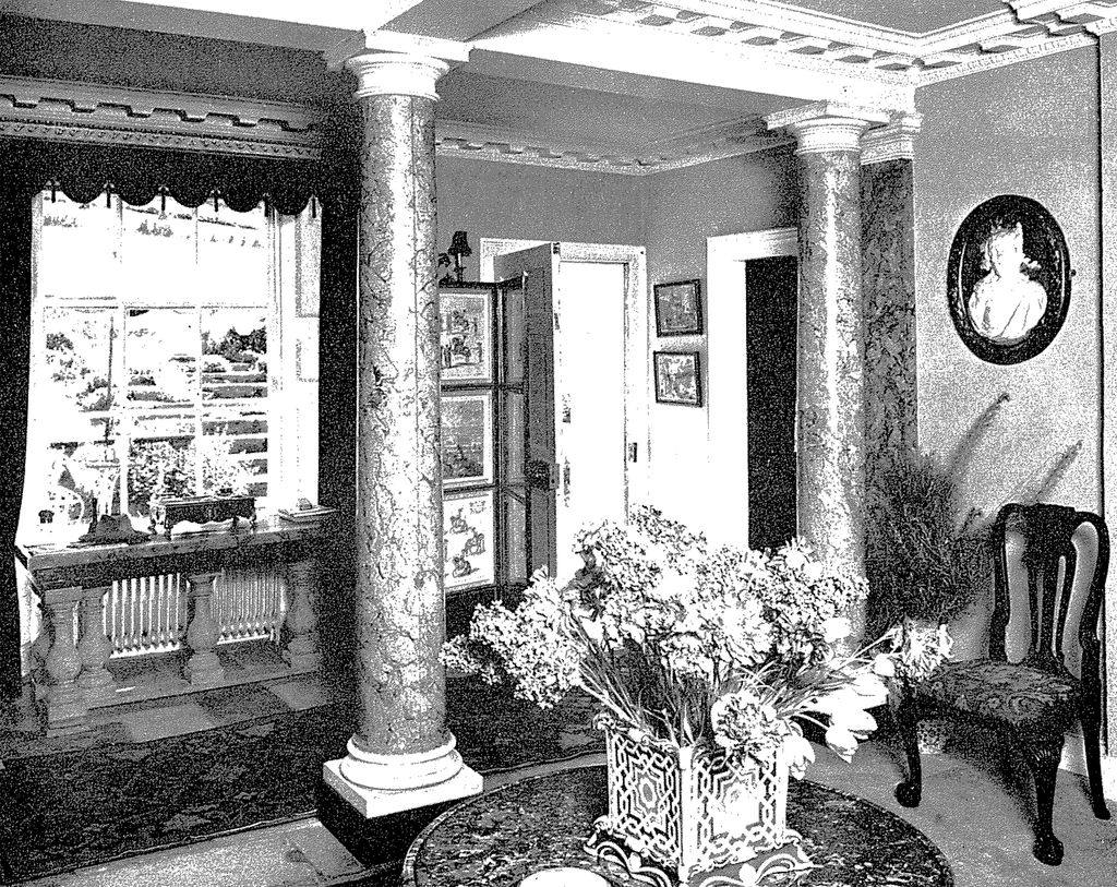 The entrance hall was transformed from a complex of cubby­holes. The design of this room was dictated by the...