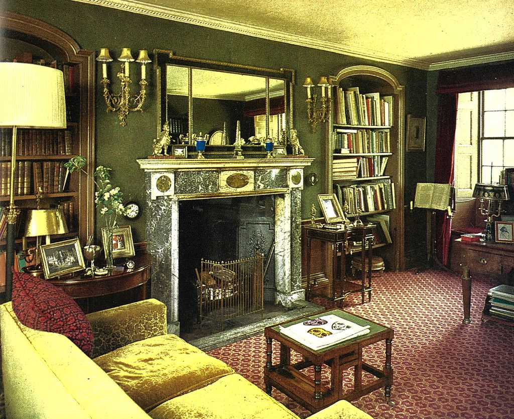 Image may contain Furniture Living Room Room Indoors Interior Design Fireplace Hearth and Couch