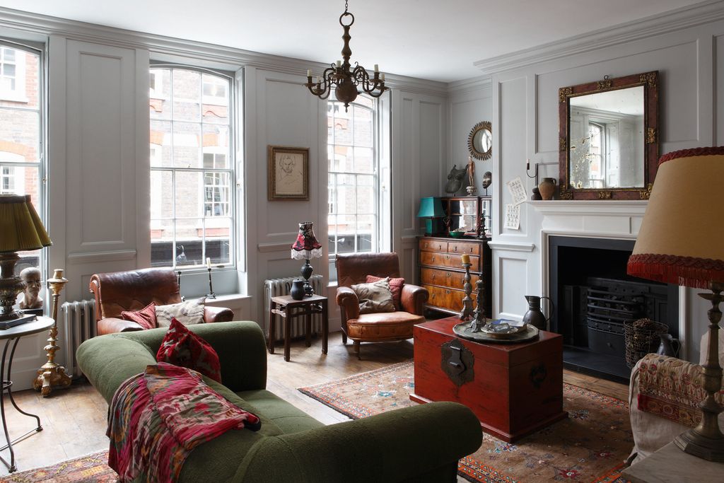 Image may contain Living Room Room Indoors Furniture Couch Interior Design Electronics Monitor Display and Screen