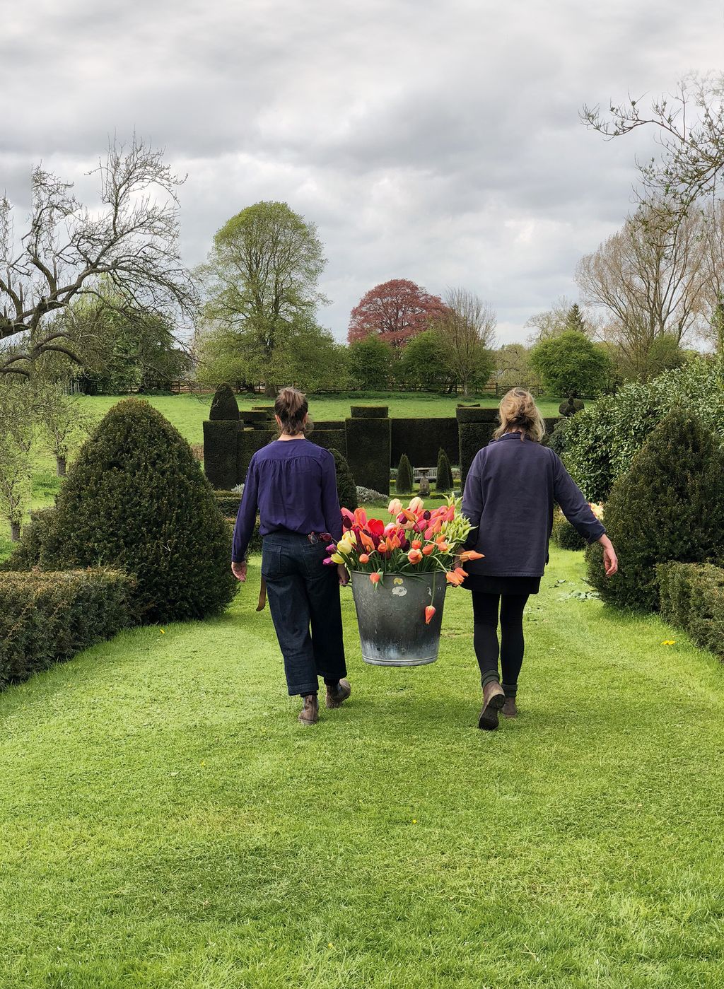 Image may contain Human Person Outdoors Garden Plant Footwear Clothing Shoe and Apparel